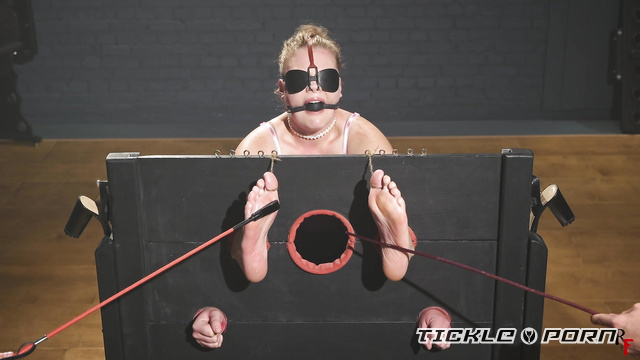 RF Studio Production - Vanda Gets Intense Bastinado And Sole Tickling While Locked In Heavy Stocks