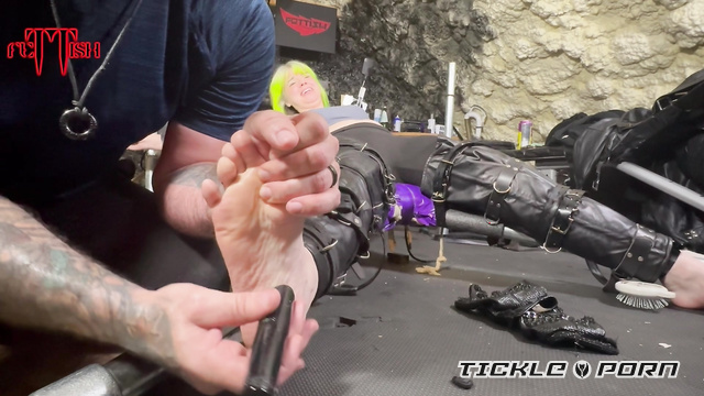 Fettish - Tickled In Steel: Green Haired And Restrained Fae Laughing From Kinky Feather