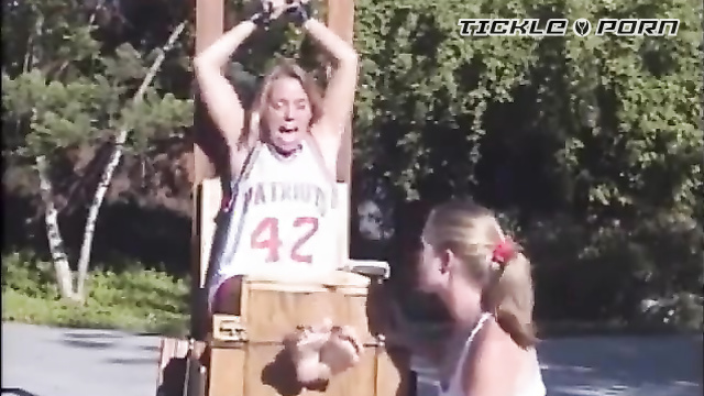 Tickling Paradise - Outdoor Giggles: Basketball Star Can't Escape the Stocks
