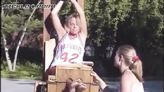 Tickling Paradise - Outdoor Giggles: Basketball Star Can't Escape the Stocks